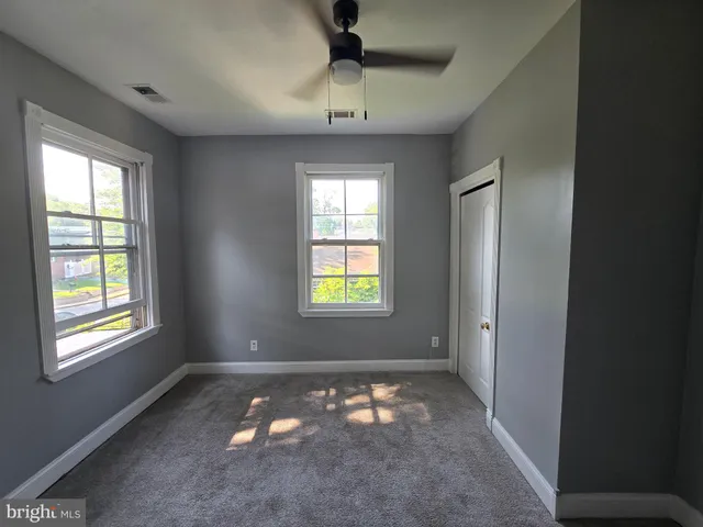 a bathroom with a shower and a bathtub