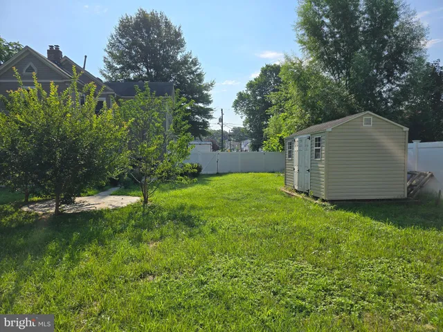 a view of gallery with wooden floor