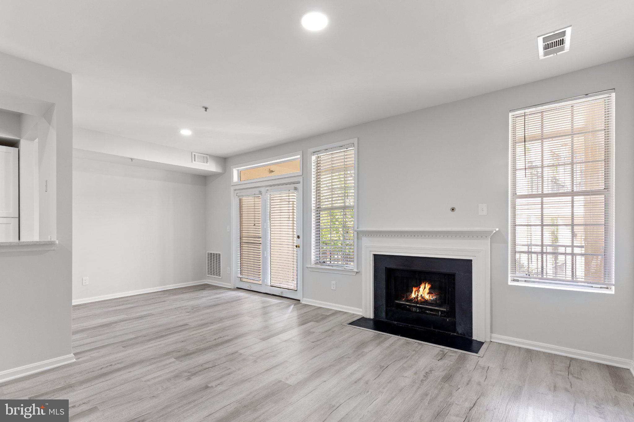 1318 Garden Wall Circle, Unit 213 Reston, VA 20194 - Photo 2 of 22 Bright and inviting living space.