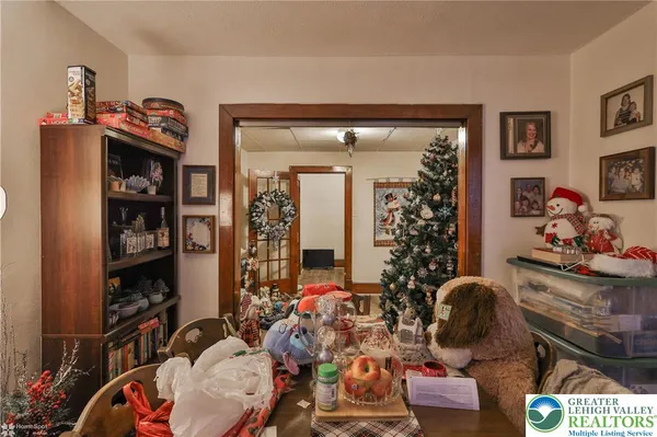 a white refrigerator freezer sitting inside of a kitchen