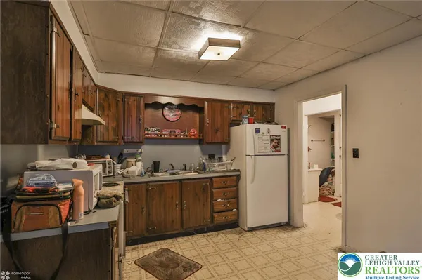 a room with furniture and a flat screen tv