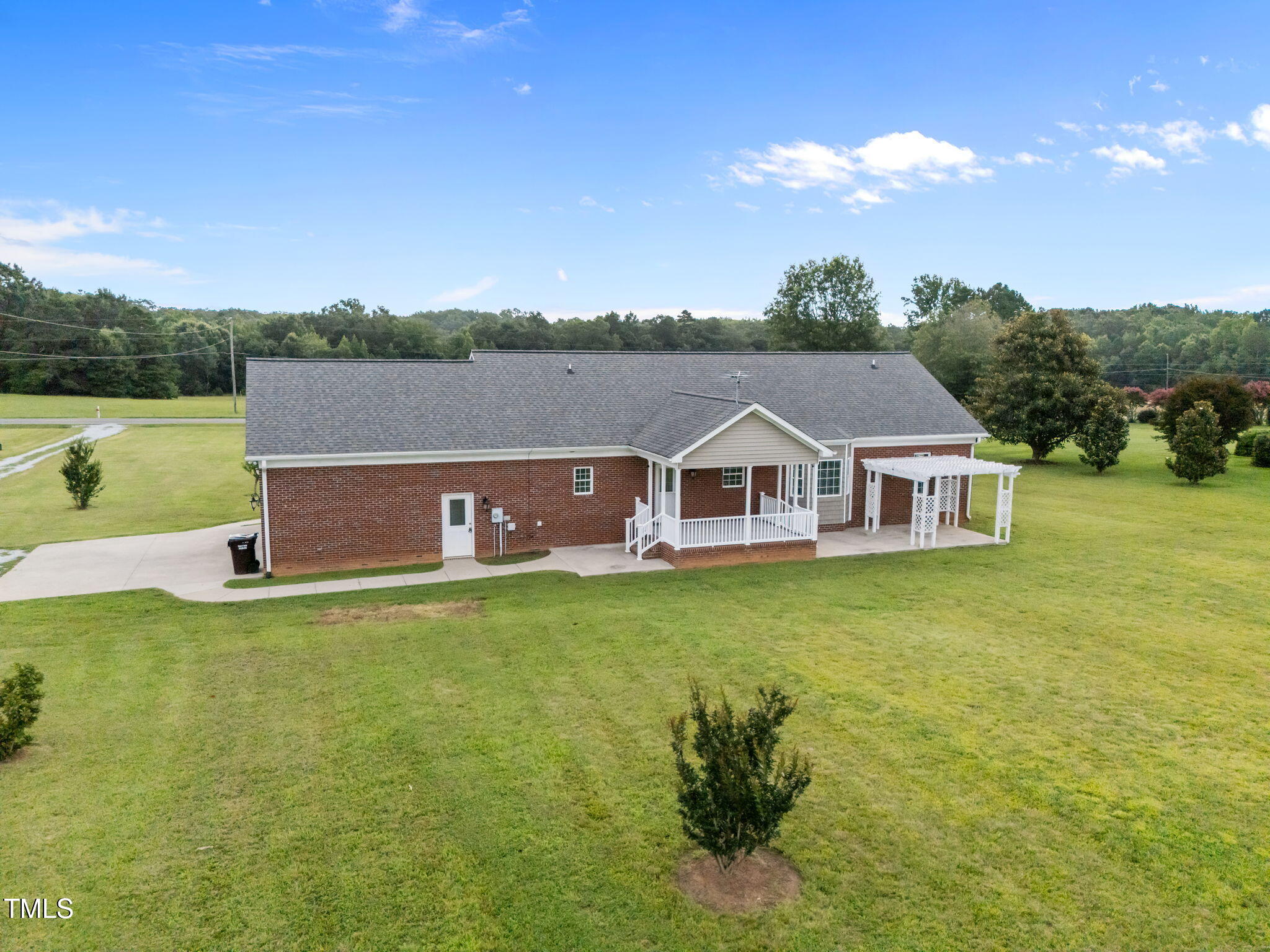 5556 Hurdle Mills Road Roxboro, NC 27574 - Photo 10 of 53 10-web-or-mls-DJI_20250717102309_0011_D