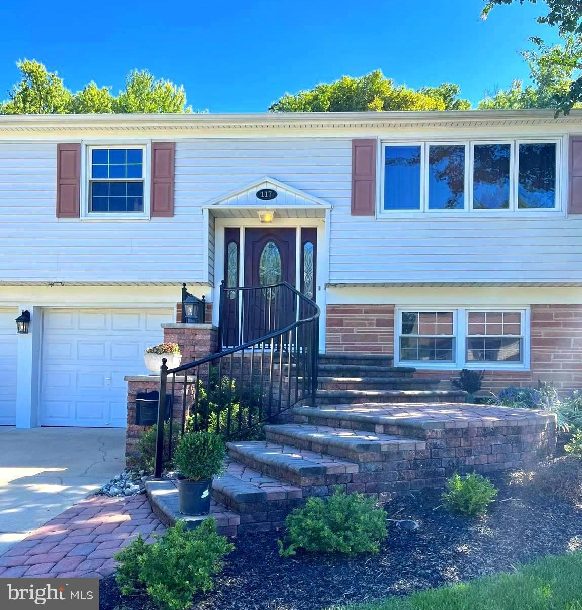 117 Knox Boulevard Marlton, NJ 08053 - Photo 1 of 21 a front view of a house with garden