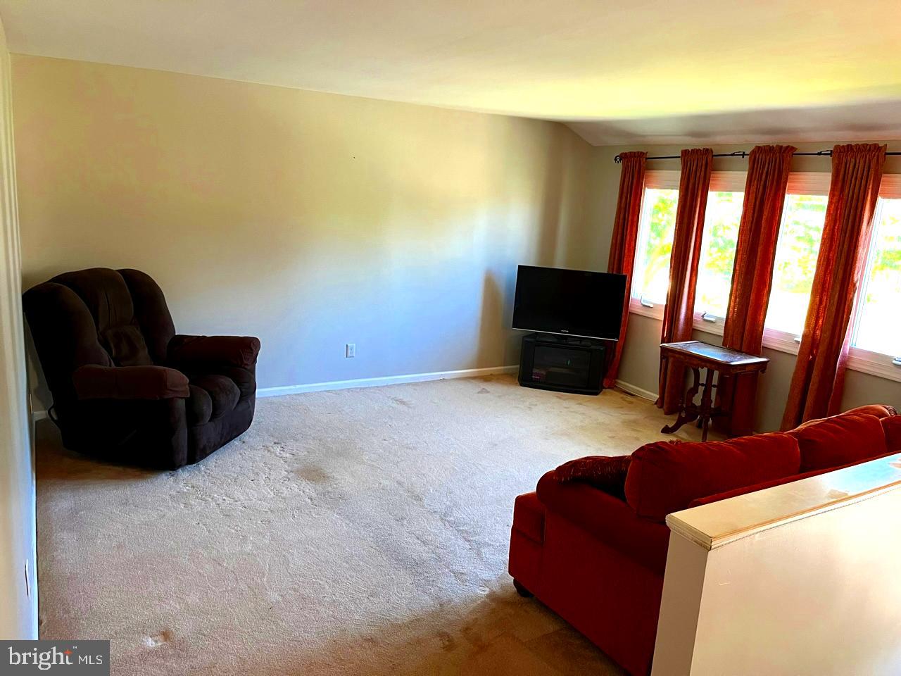 117 Knox Boulevard Marlton, NJ 08053 - Photo 2 of 21 a living room with furniture and a flat screen tv