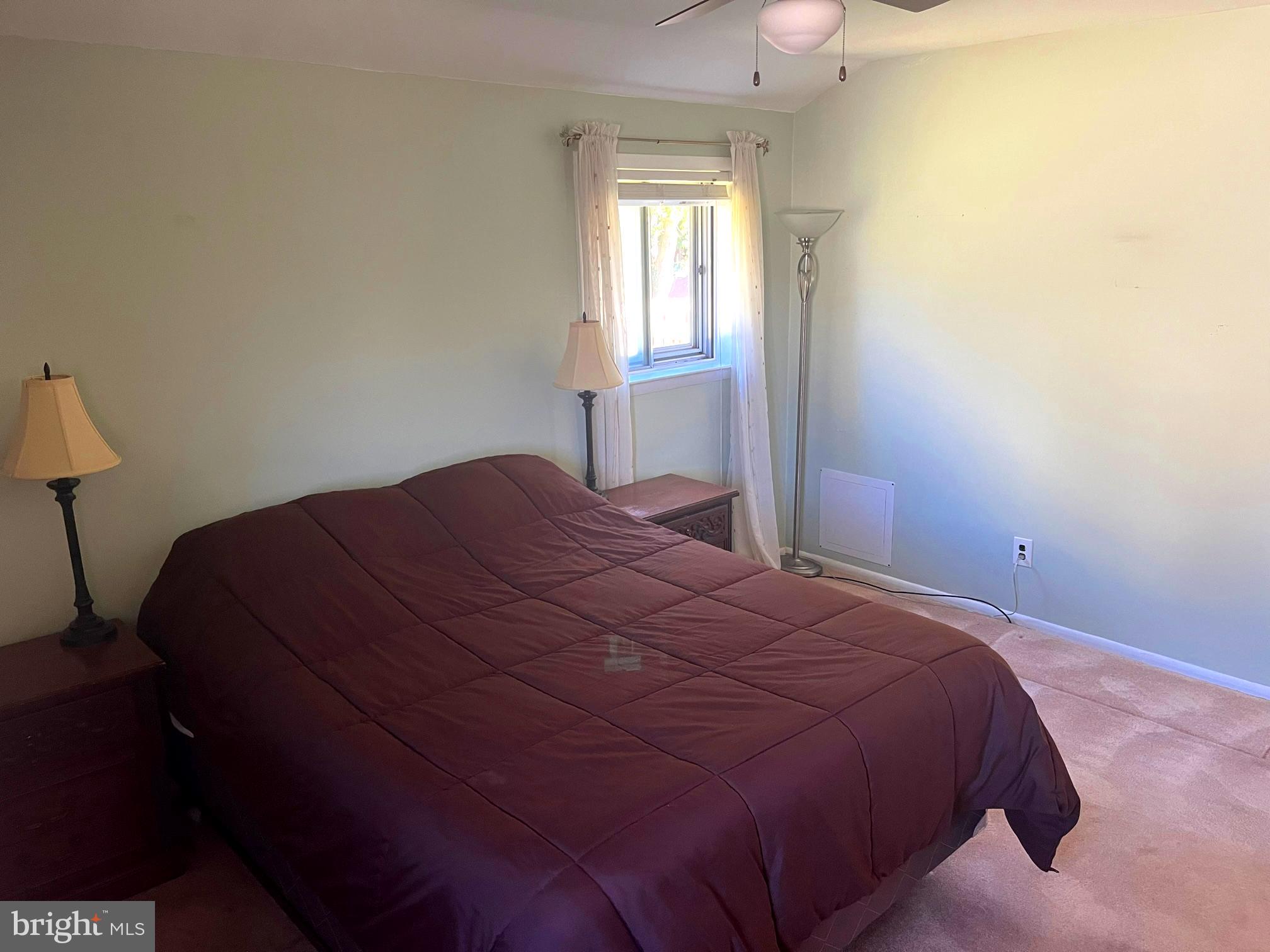 117 Knox Boulevard Marlton, NJ 08053 - Photo 9 of 21 a bedroom with a bed and a lamp