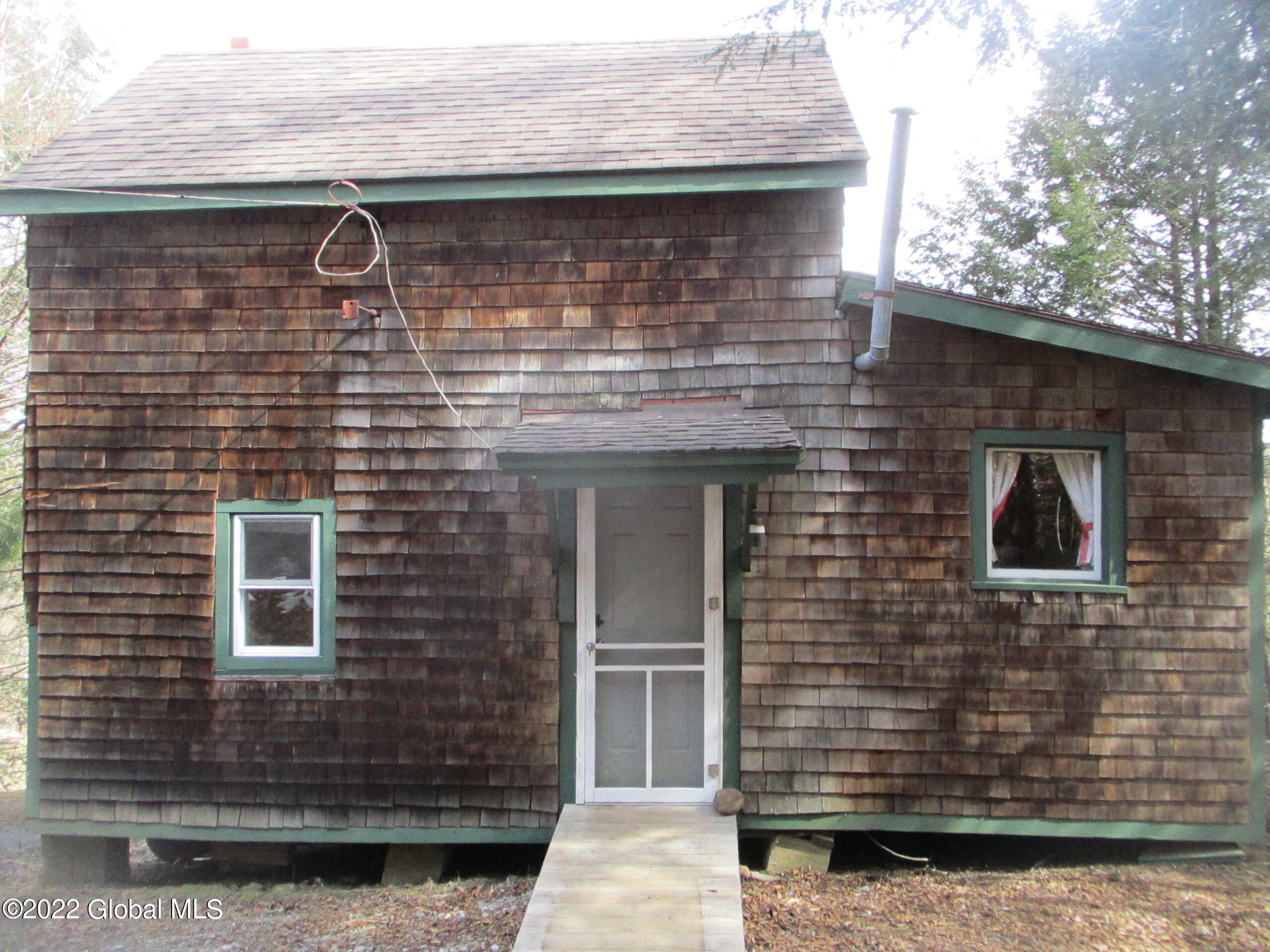 719 Lake Desolation Road Providence, NY 12850 - Photo 14 of 51 12 Rear of Cottage