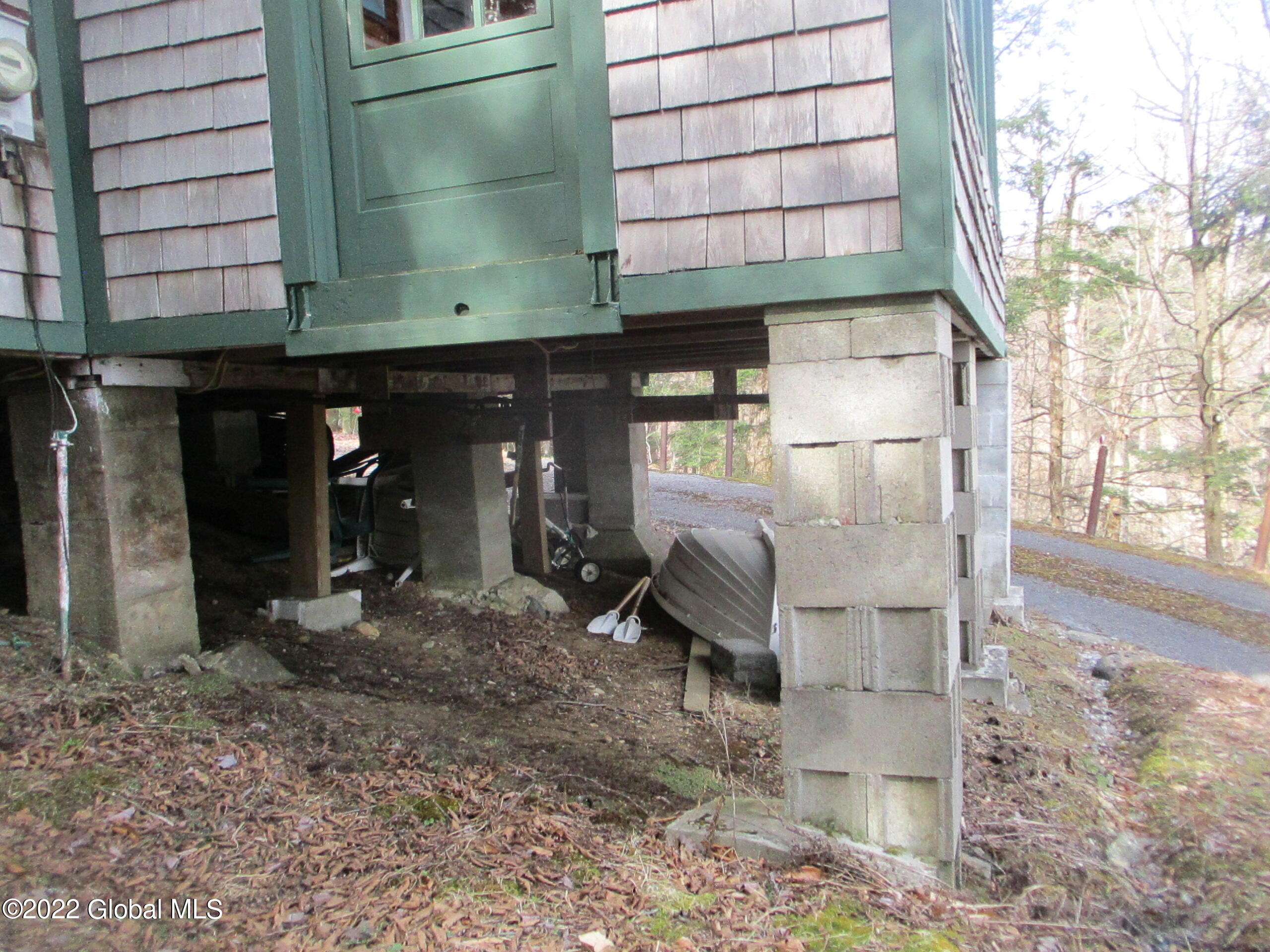 719 Lake Desolation Road Providence, NY 12850 - Photo 17 of 51 15 Cinderblock Piers, Front-Side