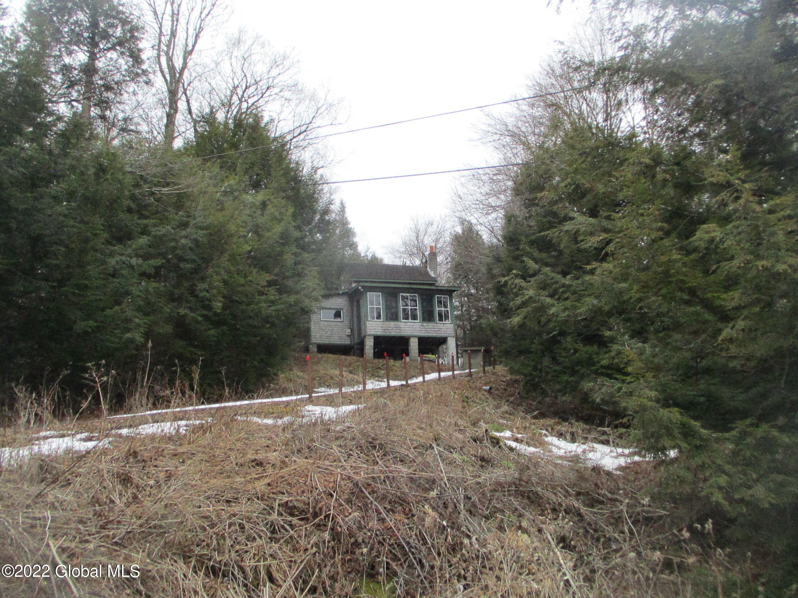 719 Lake Desolation Road Providence, NY 12850 - Photo 3 of 51 03 Cottage from Lake Desolation Road