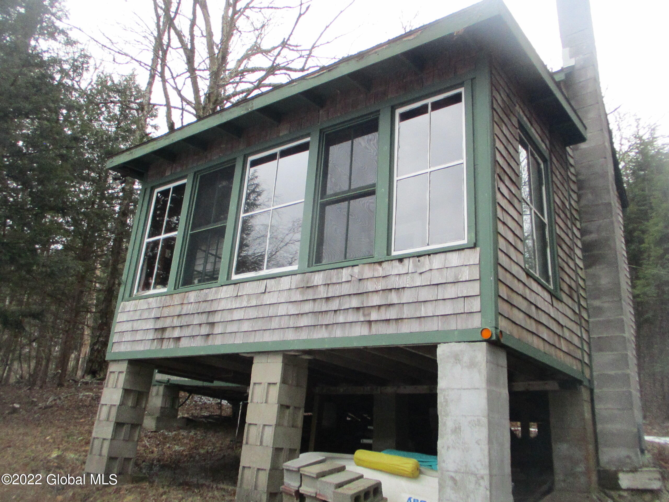 719 Lake Desolation Road Providence, NY 12850 - Photo 5 of 51 05 Front of Cottage, Enclosed Porch and