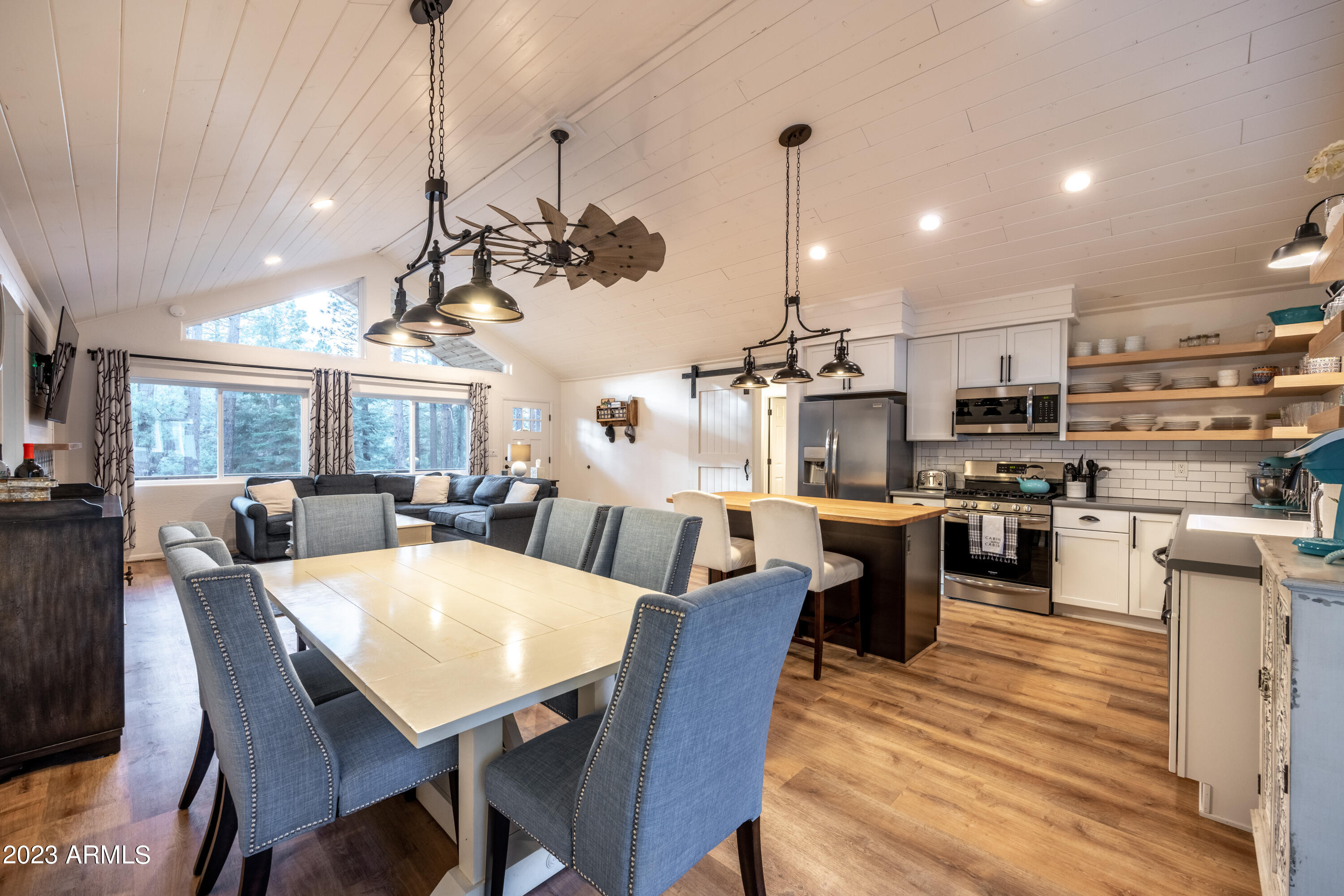 2772 Larson Loop Forest Lakes, AZ 85931 - Photo 16 of 65 a large kitchen with a table and chairs