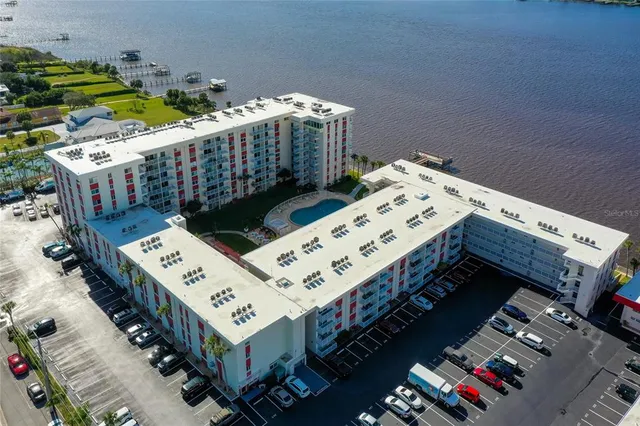 a view of a balcony with wooden floor