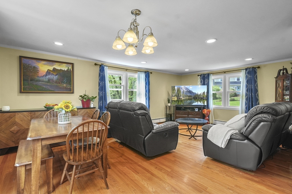 36 Duggan Road Acton, MA 01720 - Photo 15 of 40 a living room with furniture and a large window