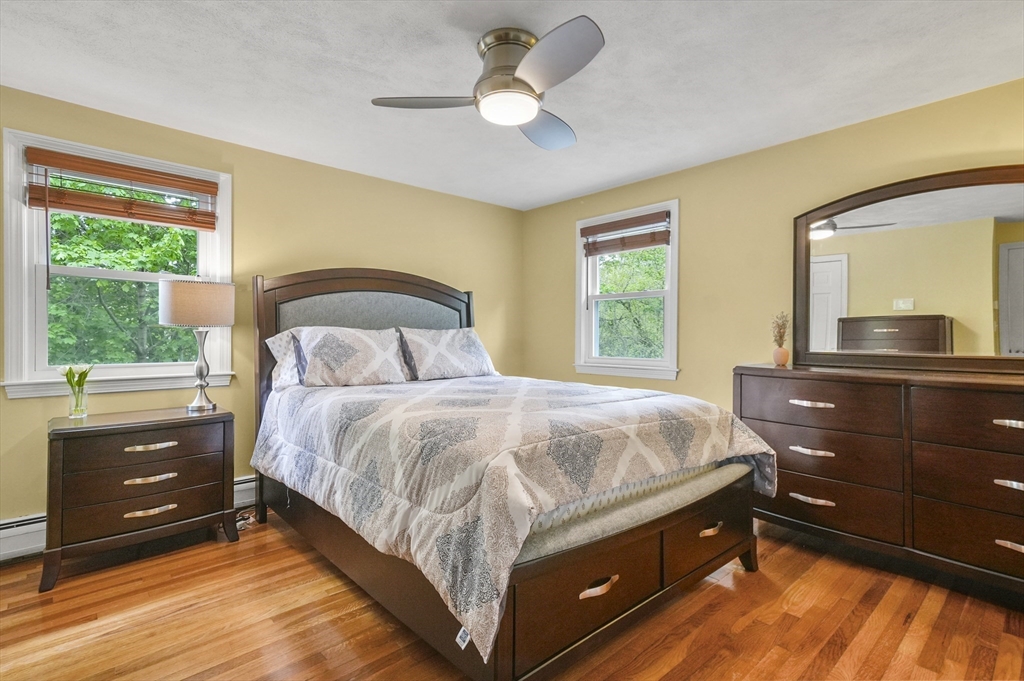 36 Duggan Road Acton, MA 01720 - Photo 19 of 40 a bedroom with a bed and a dresser