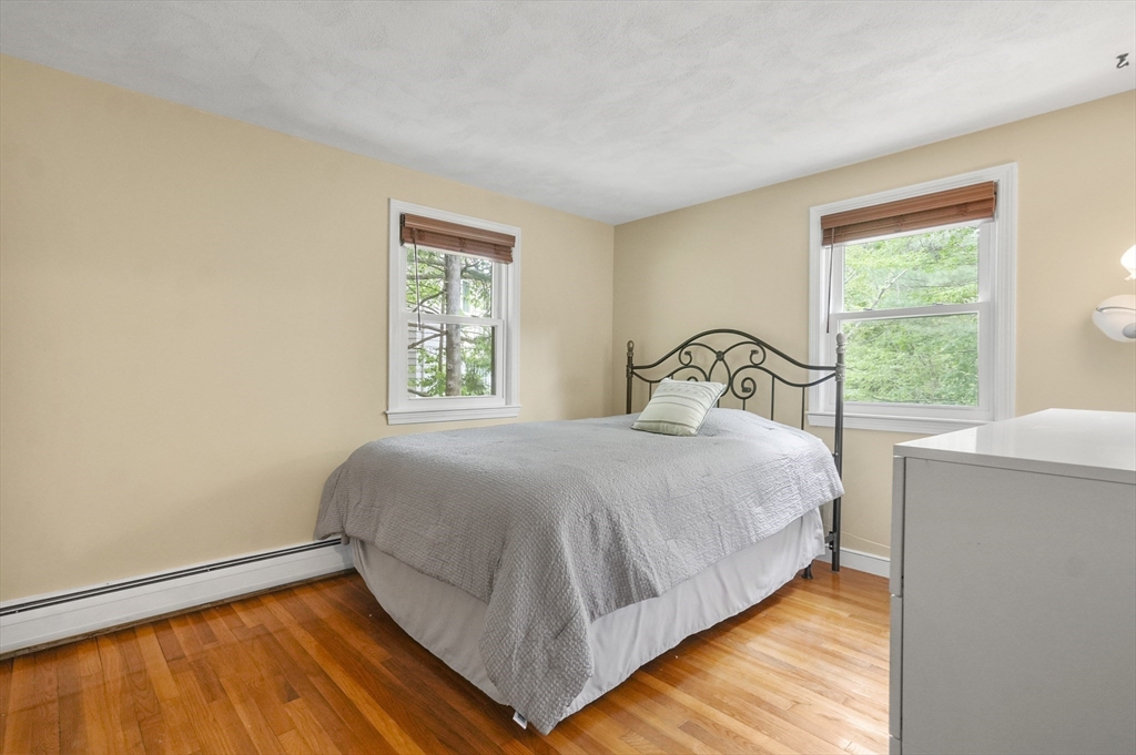 36 Duggan Road Acton, MA 01720 - Photo 24 of 40 a bedroom with a bed and window