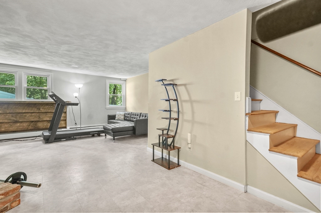 36 Duggan Road Acton, MA 01720 - Photo 28 of 40 a view of a room with gym equipment
