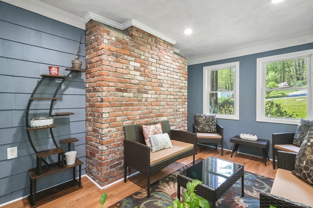 36 Duggan Road Acton, MA 01720 - Photo 31 of 40 a balcony with furniture and a potted plant