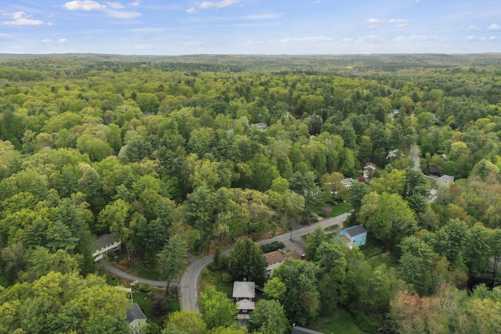 36 Duggan Road Acton, MA 01720 - Photo 38 of 40 an aerial view of residential houses with outdoor space and trees