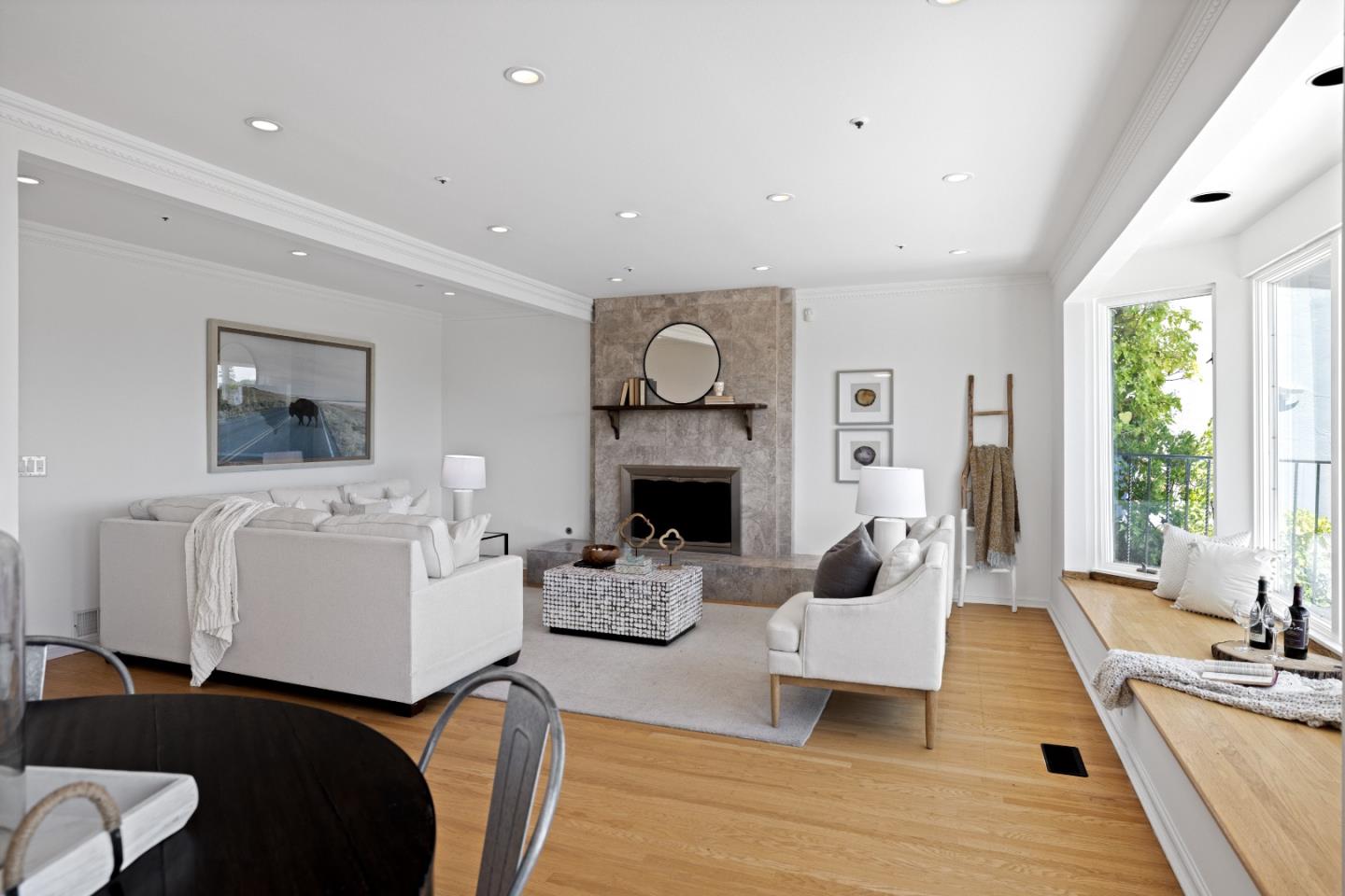 866 Morningside Drive Millbrae, CA 94030 - Photo 17 of 57 a living room with furniture and a fireplace