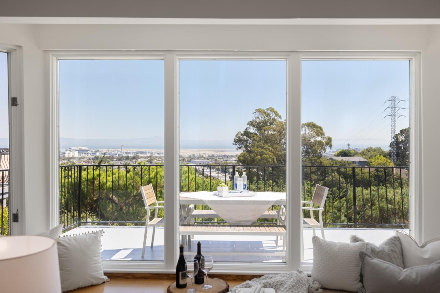 866 Morningside Drive Millbrae, CA 94030 - Photo 19 of 57 a living room with large windows