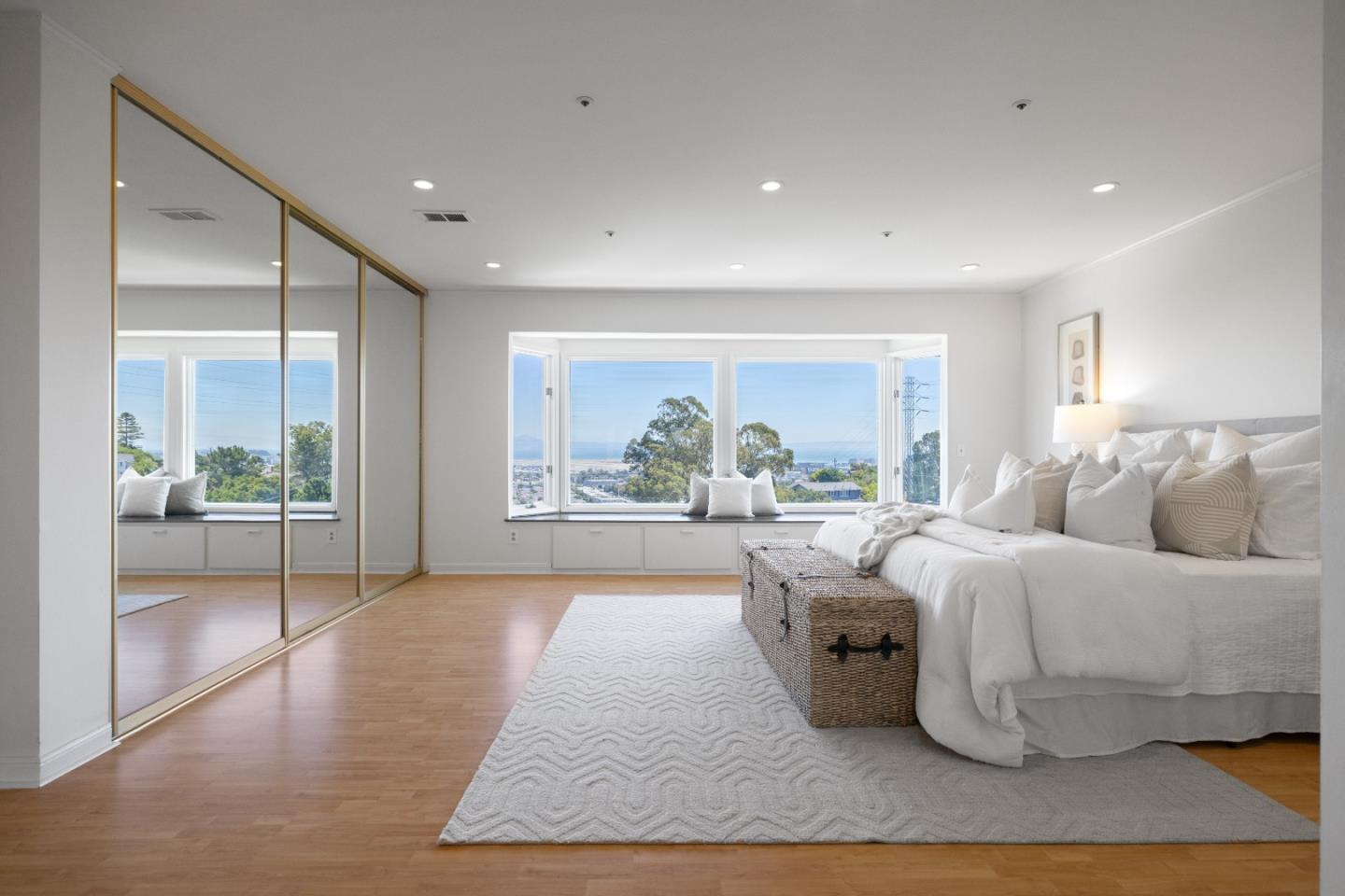 866 Morningside Drive Millbrae, CA 94030 - Photo 26 of 57 a living room with furniture and a large window