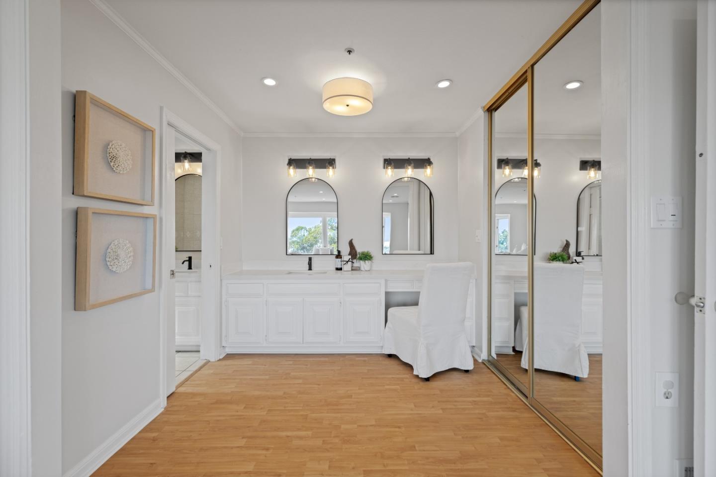 866 Morningside Drive Millbrae, CA 94030 - Photo 28 of 57 a view of a hallway with closet and mirror