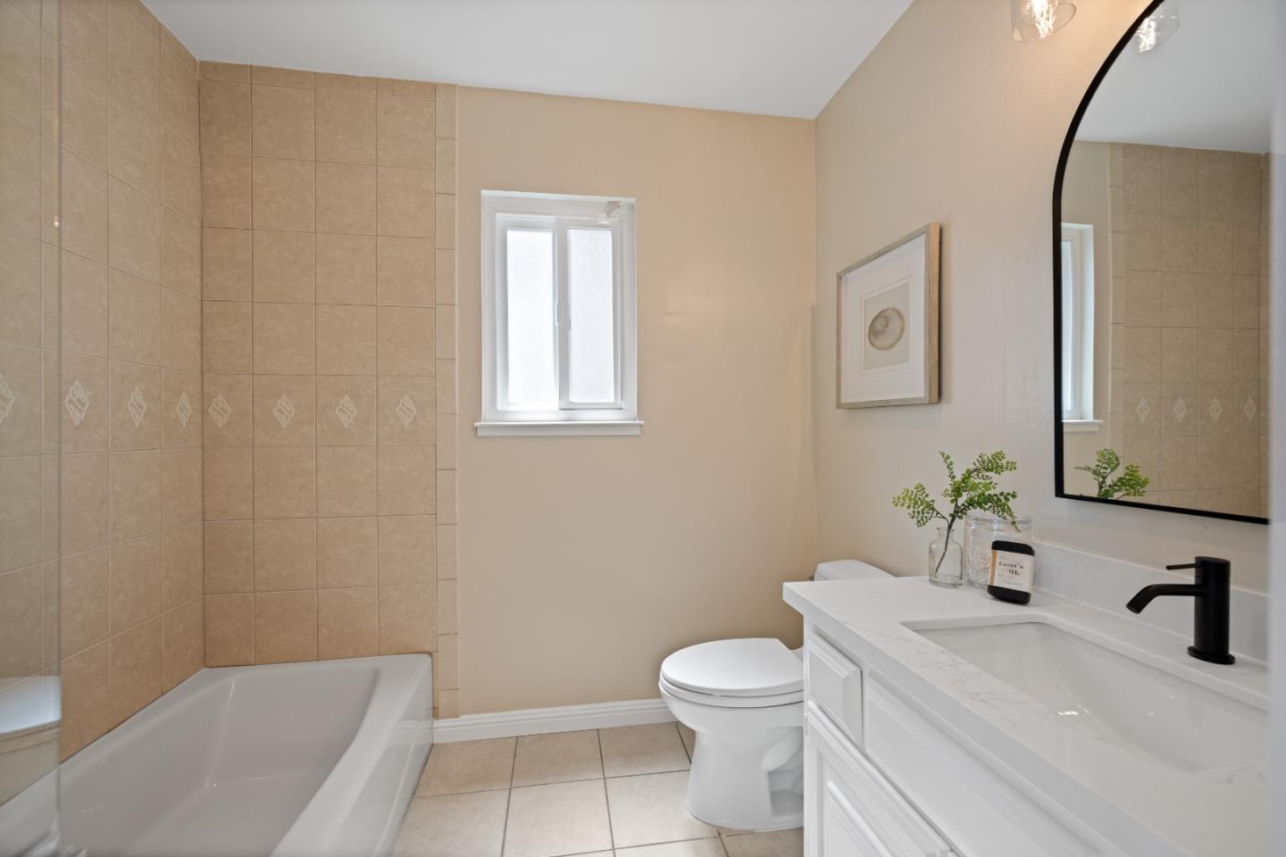 866 Morningside Drive Millbrae, CA 94030 - Photo 29 of 57 a bathroom with a sink a toilet and shower