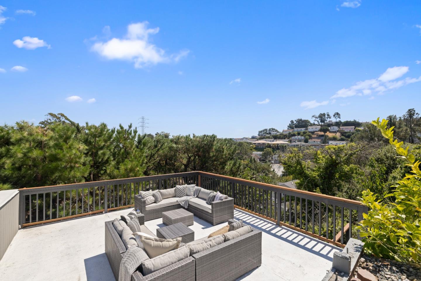 866 Morningside Drive Millbrae, CA 94030 - Photo 37 of 57 a view of a roof deck with couches and sky view