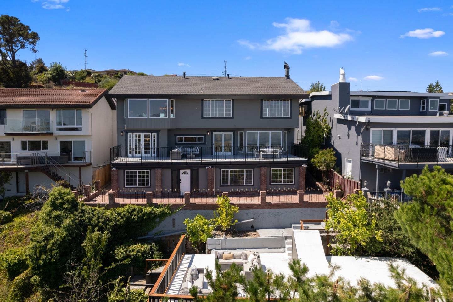 866 Morningside Drive Millbrae, CA 94030 - Photo 41 of 57 a front view of a residential apartment building with a yard