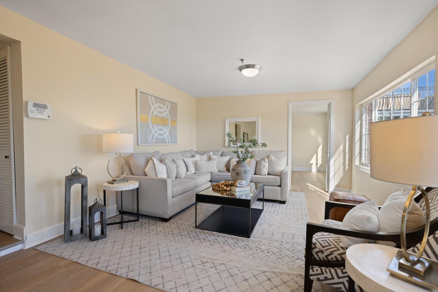 866 Morningside Drive Millbrae, CA 94030 - Photo 46 of 57 a living room with furniture and a flat screen tv