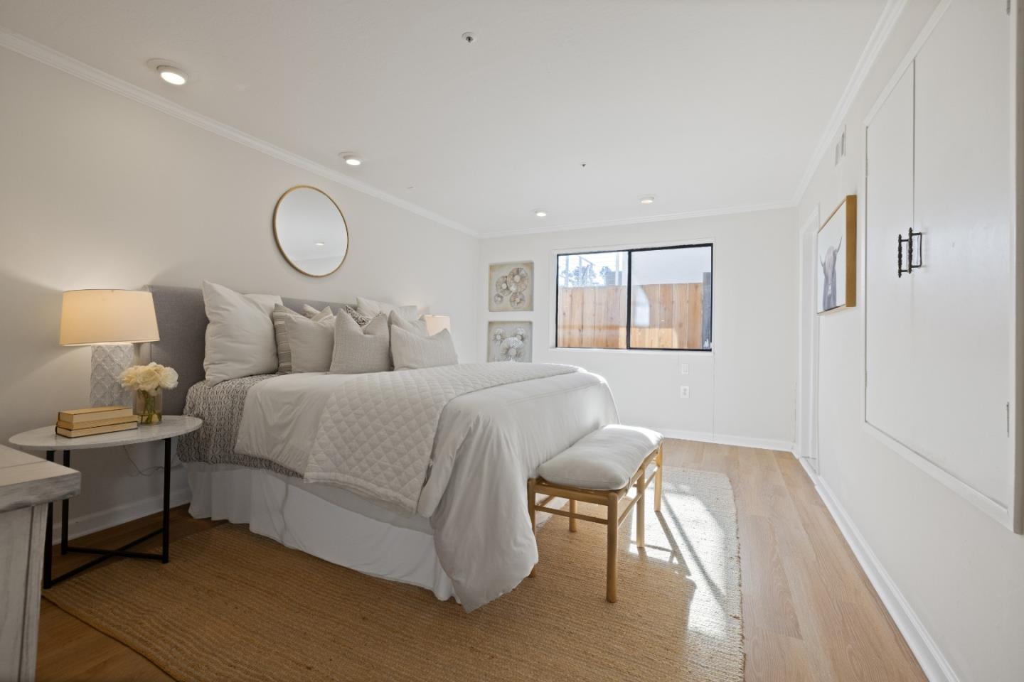 866 Morningside Drive Millbrae, CA 94030 - Photo 51 of 57 a bedroom with a bed and wooden floor