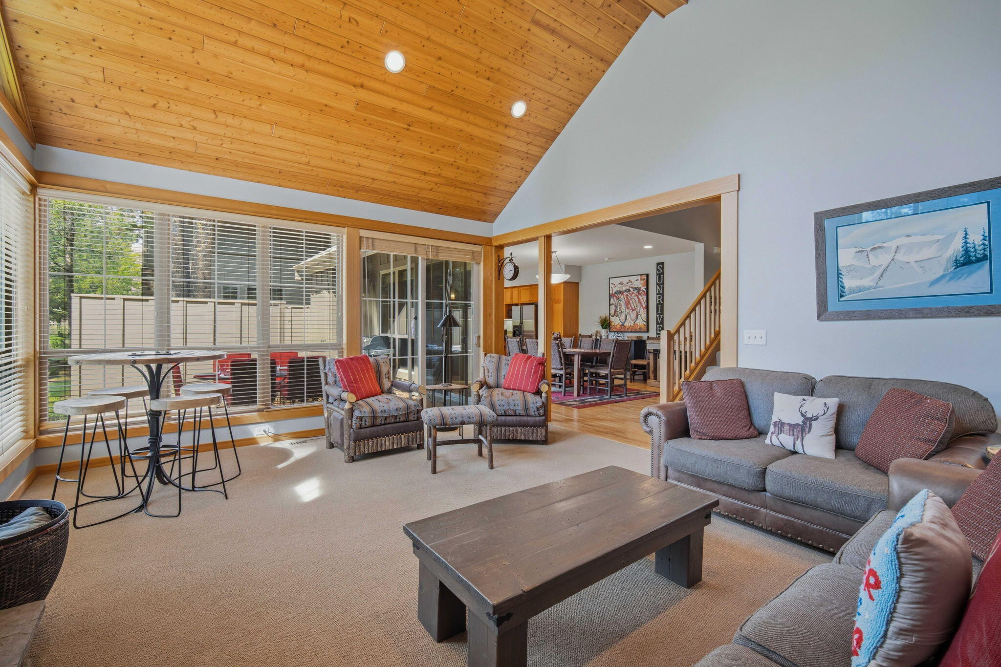 57129 Evergreen Loop, Unit 44 Sunriver, OR 97707 - Photo 22 of 59 a living room with furniture and a large window