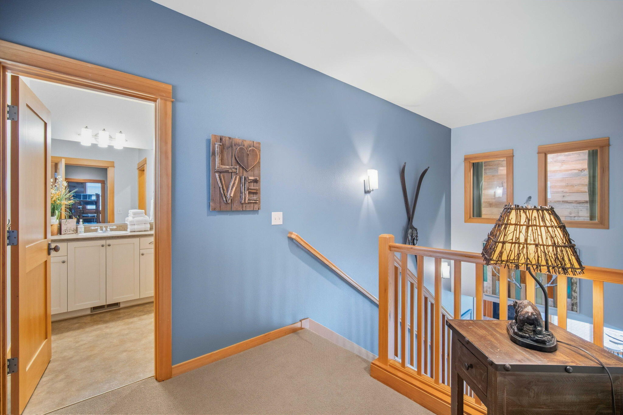 57129 Evergreen Loop, Unit 44 Sunriver, OR 97707 - Photo 24 of 59 workspace with wooden floor windows and stairs