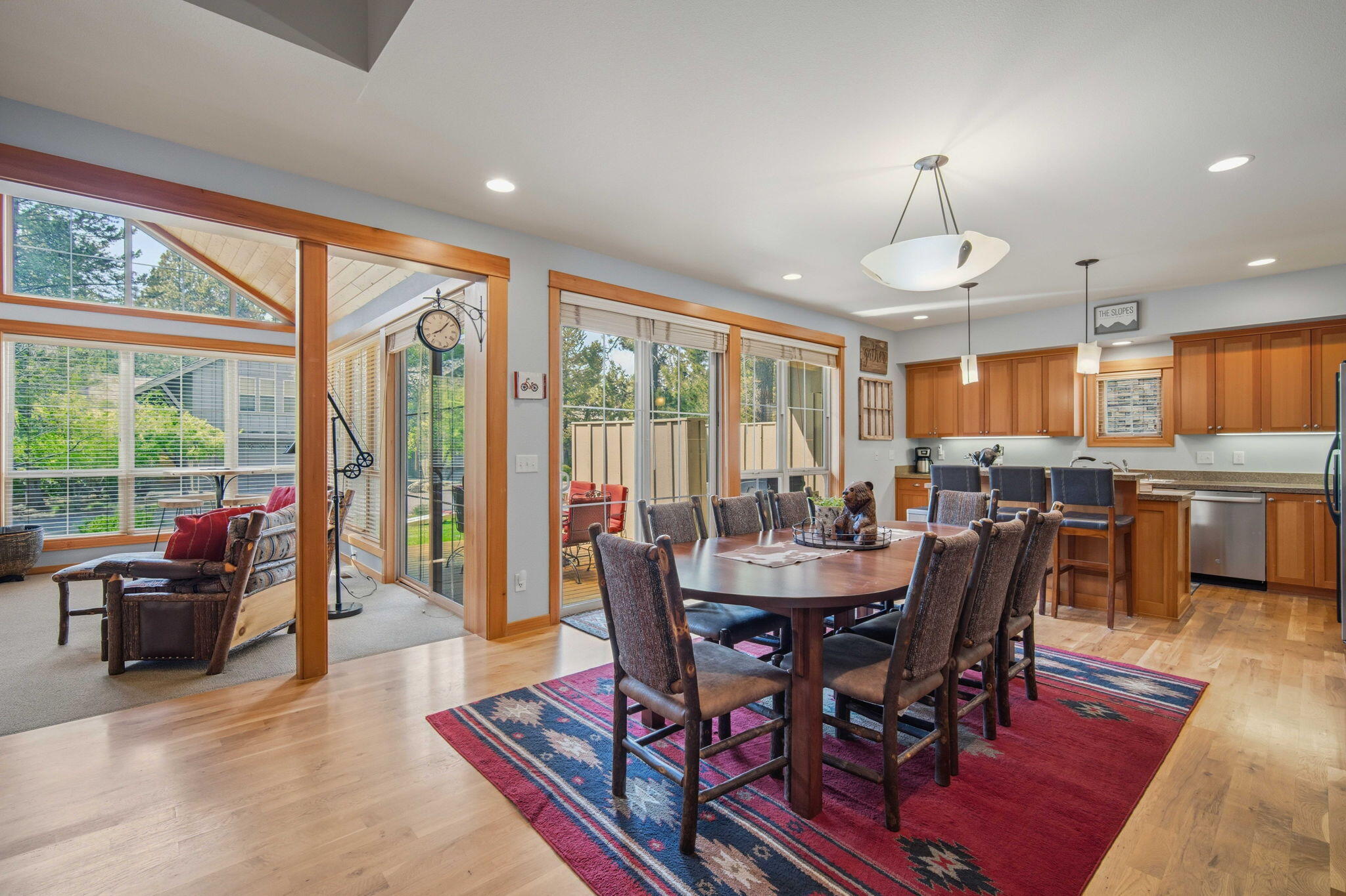 57129 Evergreen Loop, Unit 44 Sunriver, OR 97707 - Photo 3 of 59 a view of a dining room with furniture window and wooden floor
