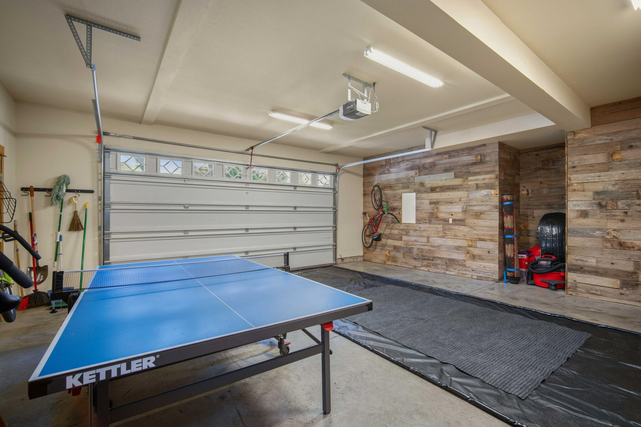 57129 Evergreen Loop, Unit 44 Sunriver, OR 97707 - Photo 39 of 59 a view of a room with wooden floor and windows