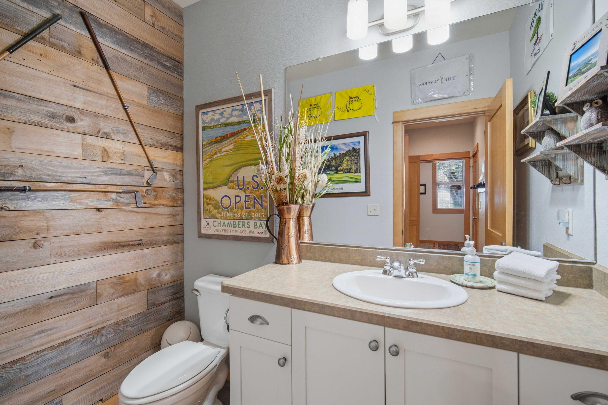 57129 Evergreen Loop, Unit 44 Sunriver, OR 97707 - Photo 40 of 59 a bathroom with a granite countertop sink toilet and shower