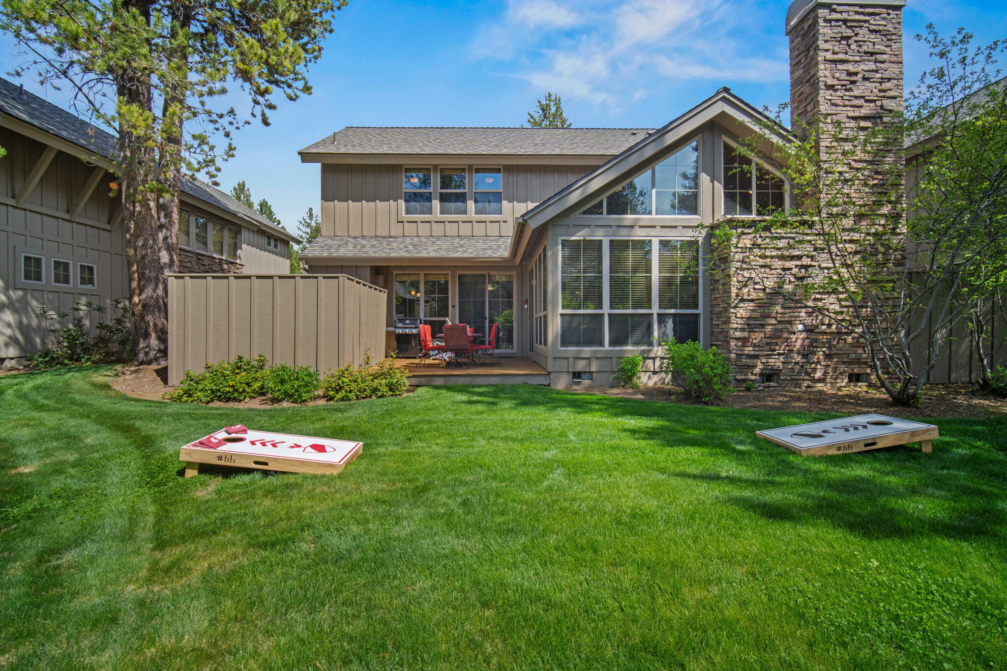 57129 Evergreen Loop, Unit 44 Sunriver, OR 97707 - Photo 6 of 59 a front view of a house with a yard