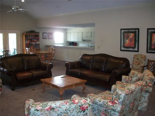 a living room with furniture and a couch