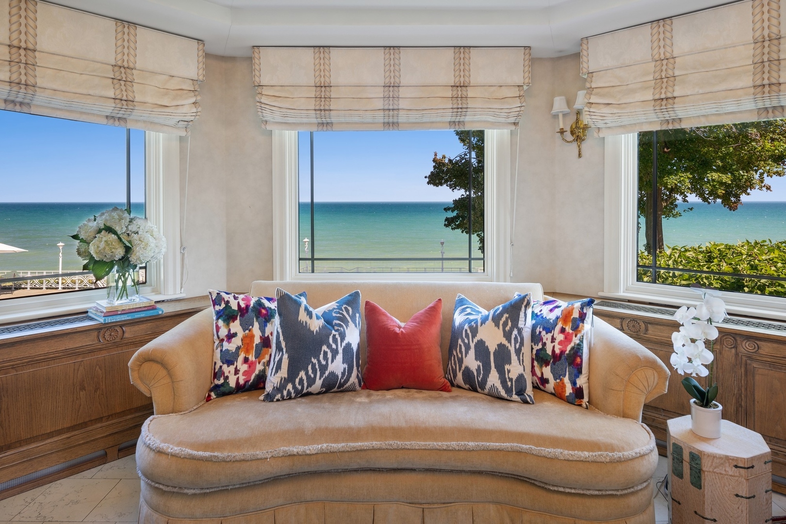 445 Sheridan Road Winnetka, IL 60093 - Photo 12 of 74 a white couch sitting in a bedroom next to a window