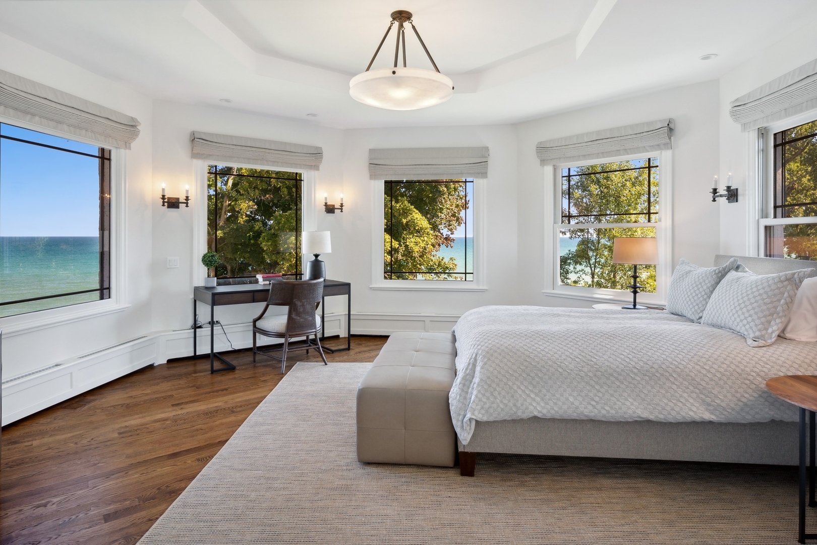445 Sheridan Road Winnetka, IL 60093 - Photo 20 of 74 a bedroom with a bed wooden floor and window