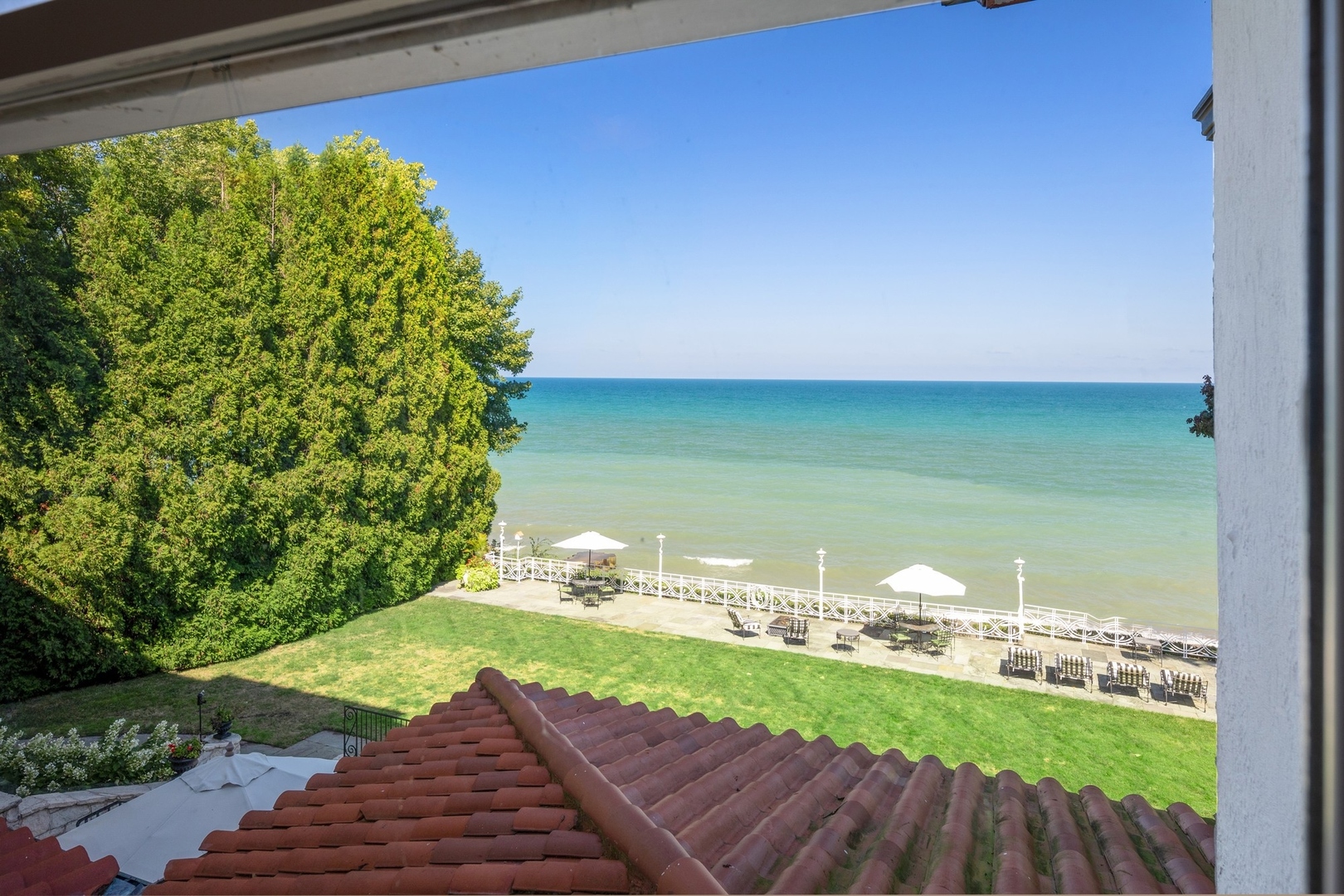 445 Sheridan Road Winnetka, IL 60093 - Photo 21 of 74 a view of a yard with an outdoor space