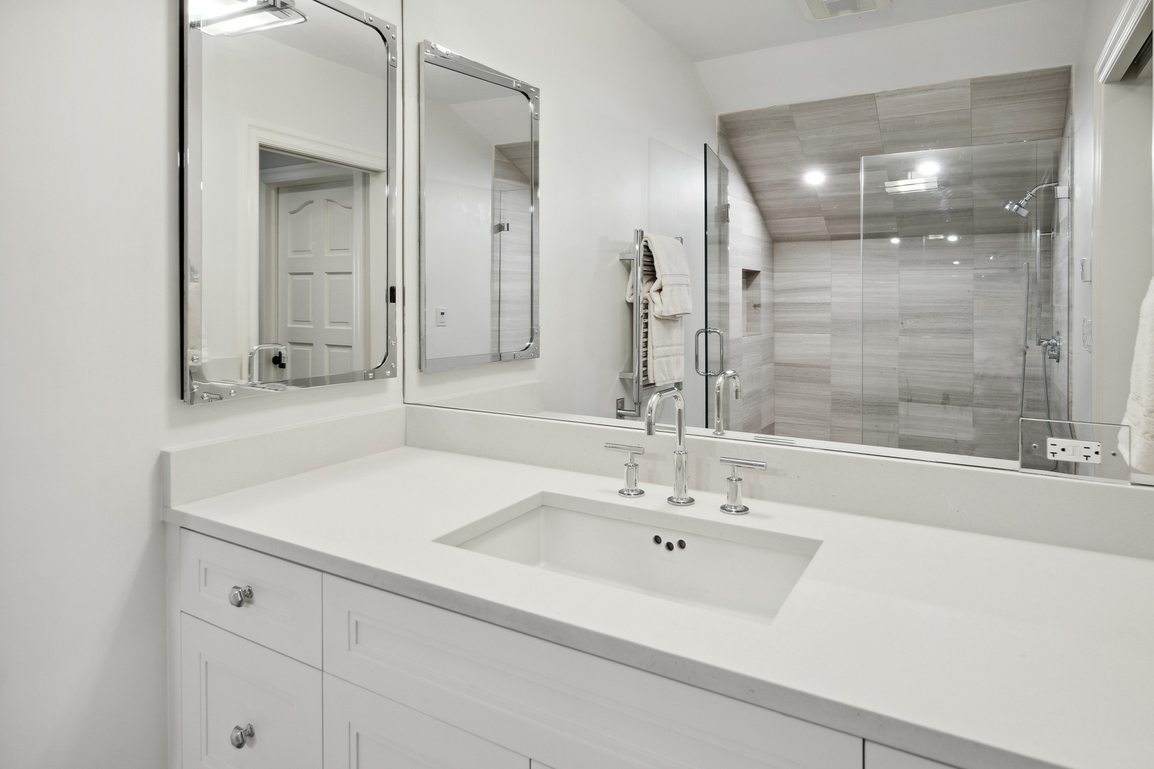 445 Sheridan Road Winnetka, IL 60093 - Photo 25 of 74 a bathroom with a sink tub shower and a mirror