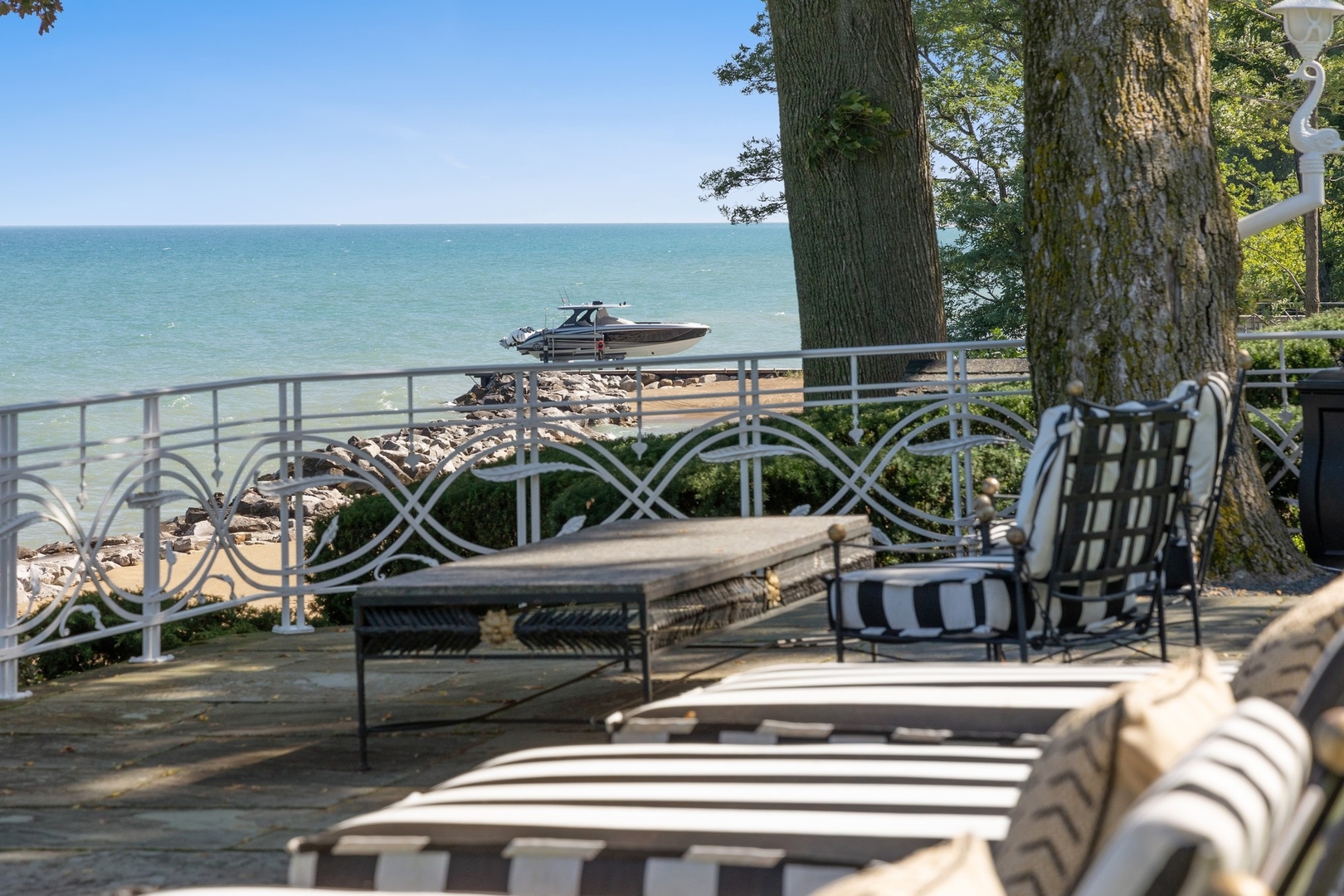 445 Sheridan Road Winnetka, IL 60093 - Photo 40 of 74 a view of a chairs and table on the terrace