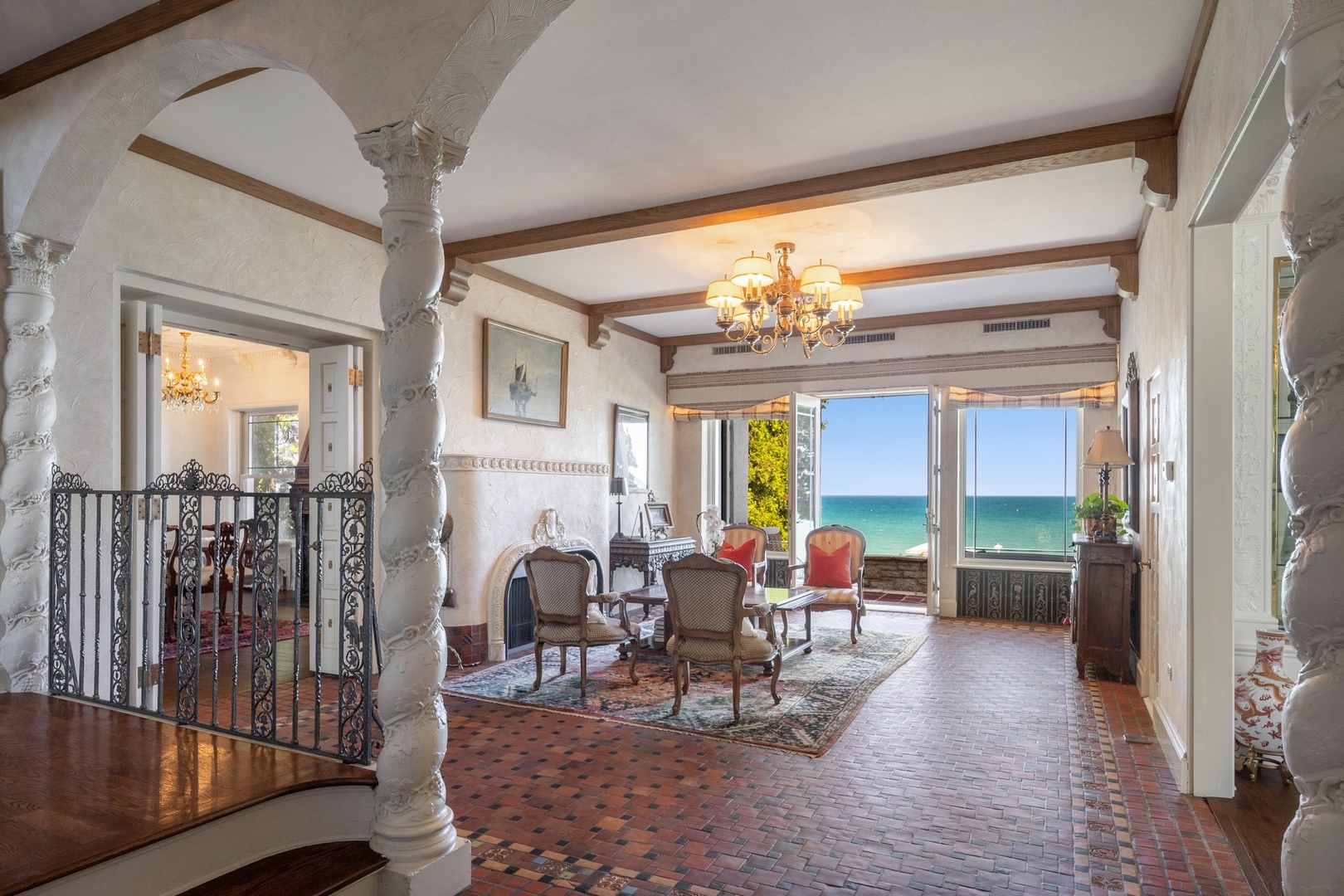 445 Sheridan Road Winnetka, IL 60093 - Photo 4 of 74 a living room with furniture and a chandelier