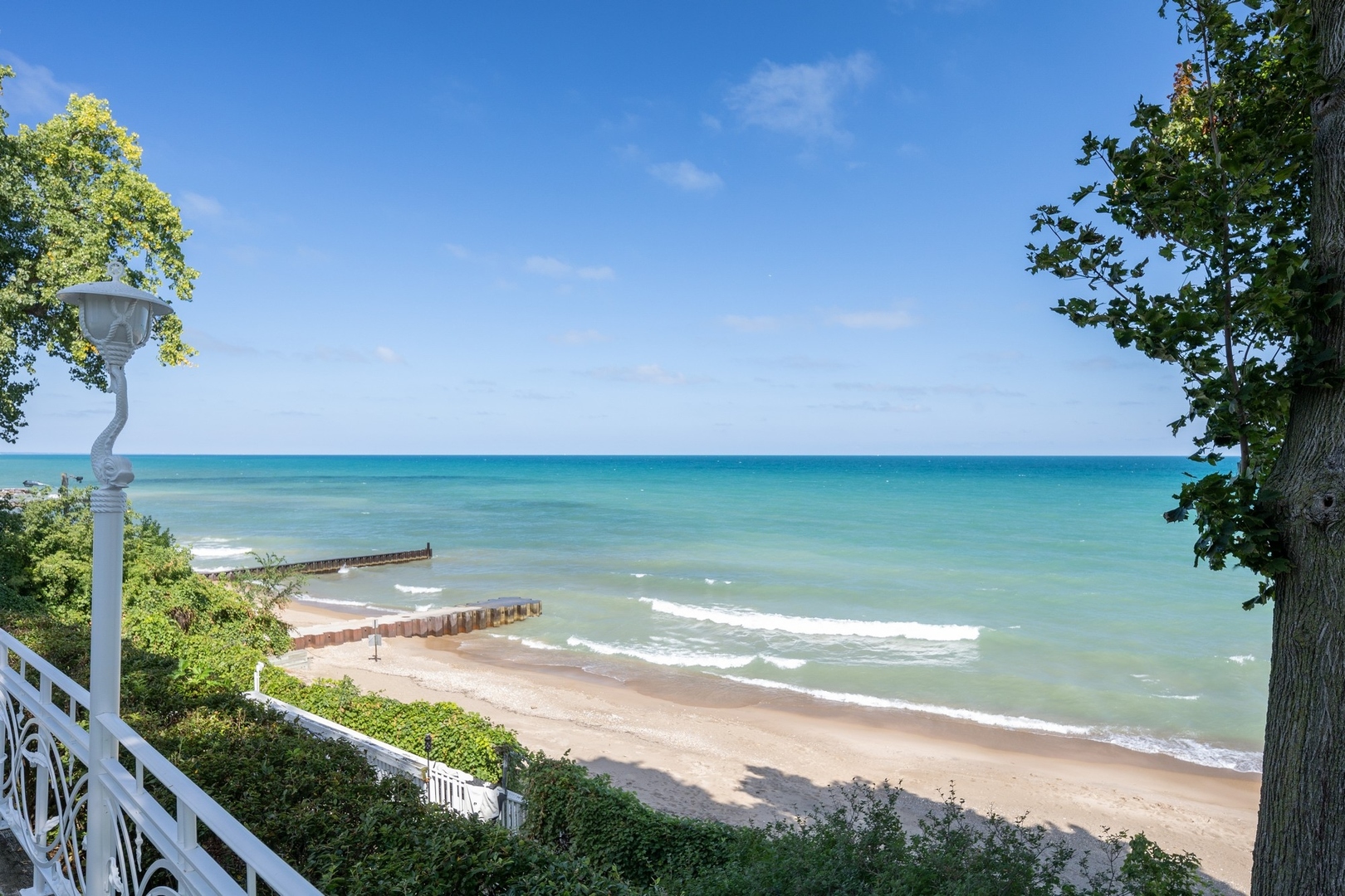 445 Sheridan Road Winnetka, IL 60093 - Photo 41 of 74 a view of a lake with a big yard