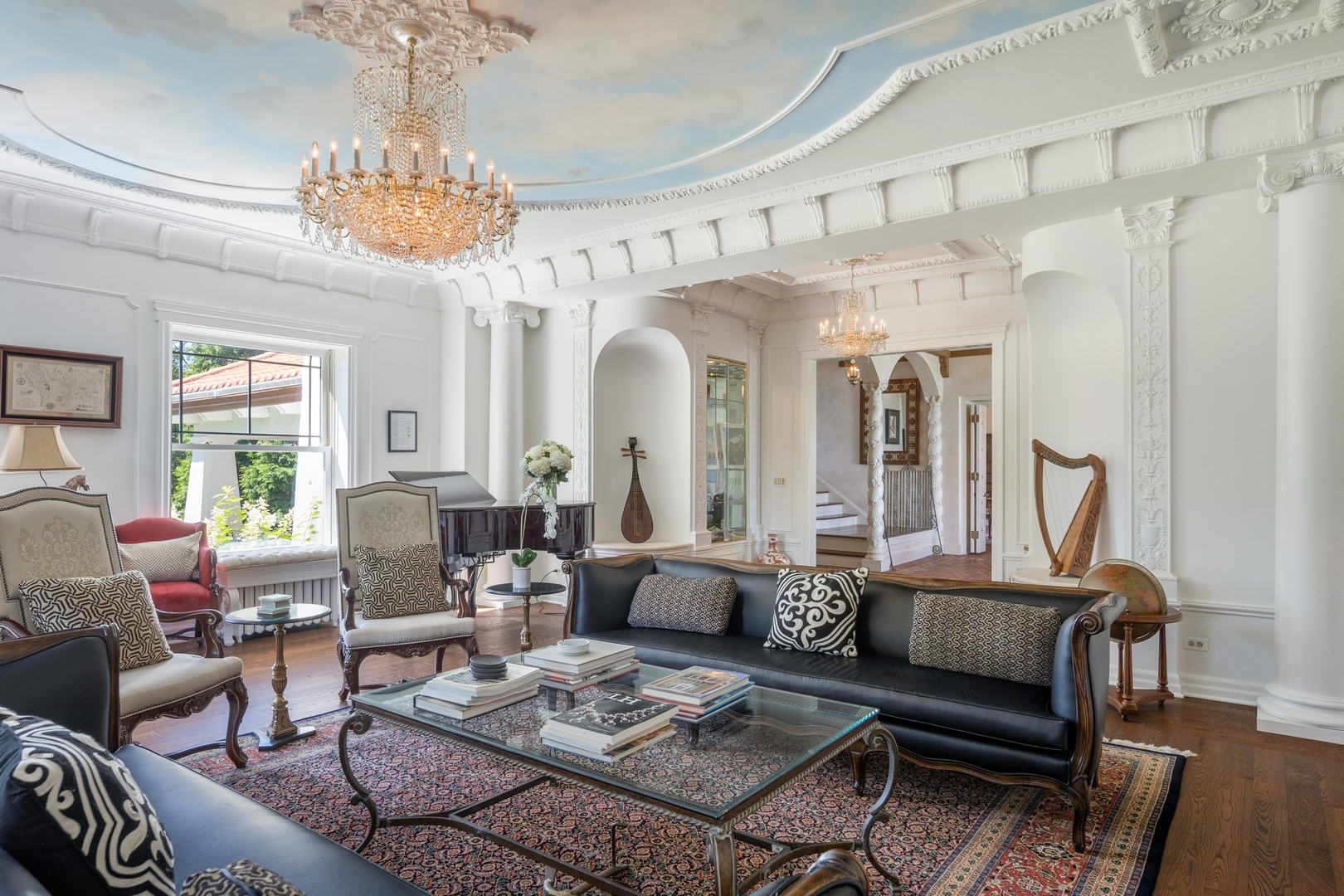 445 Sheridan Road Winnetka, IL 60093 - Photo 8 of 74 a living room with furniture chandelier and a chandelier