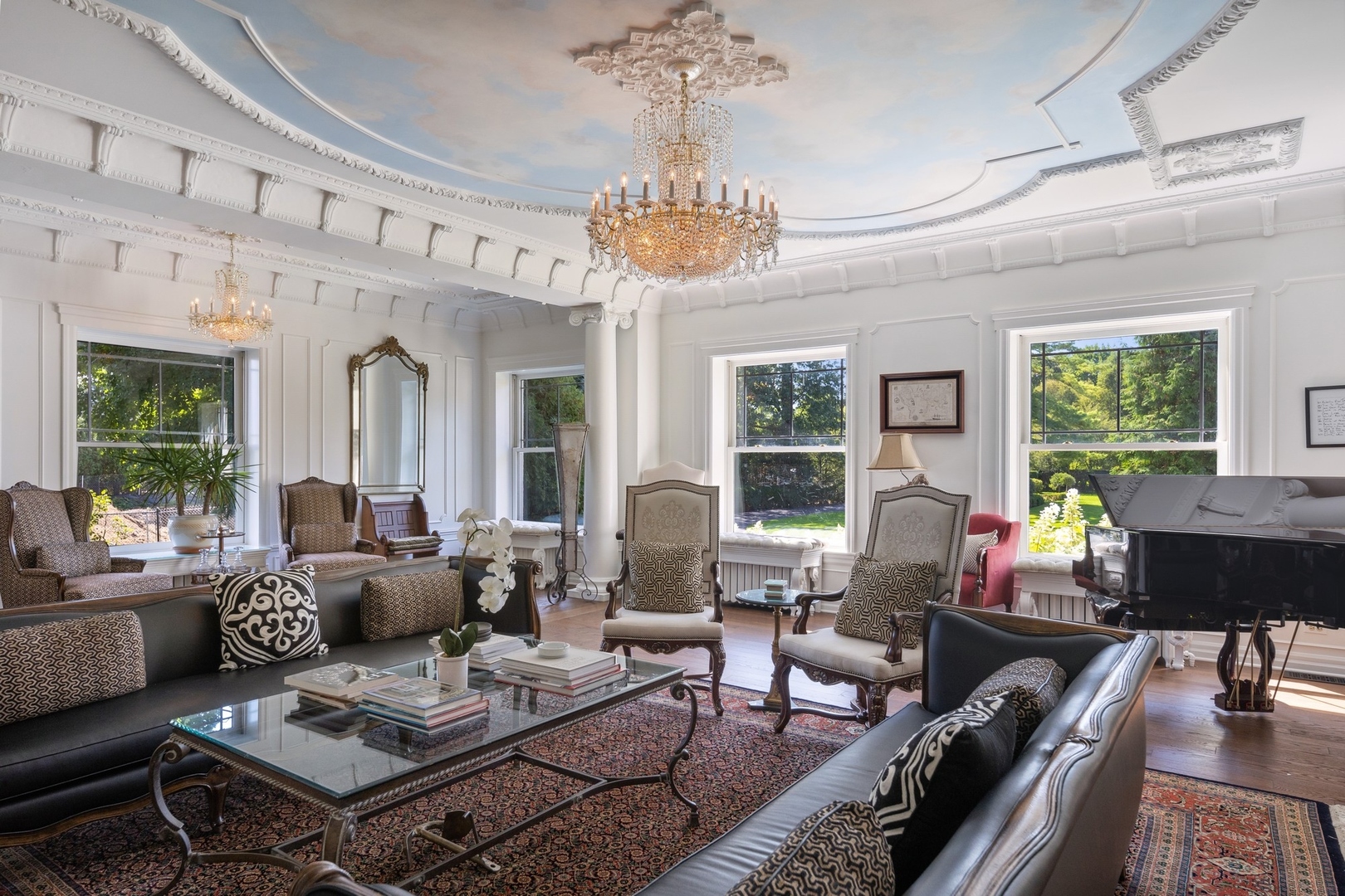 445 Sheridan Road Winnetka, IL 60093 - Photo 9 of 74 a living room with furniture chandelier and large windows