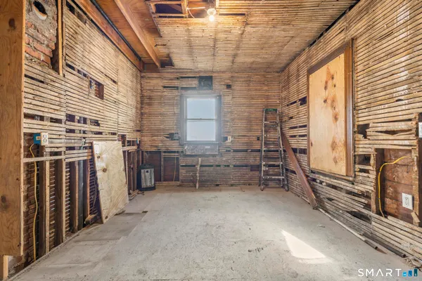 a view of a storage with utility room