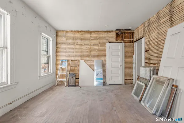 a view of an empty room with a window