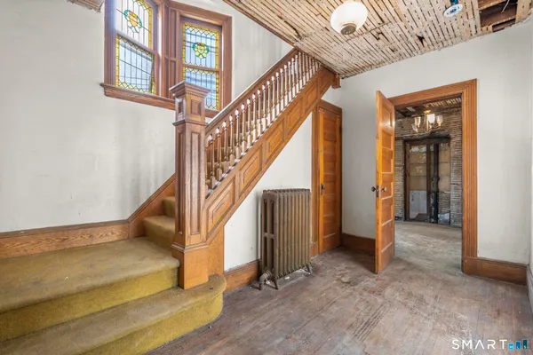 a view of an entryway with staircase