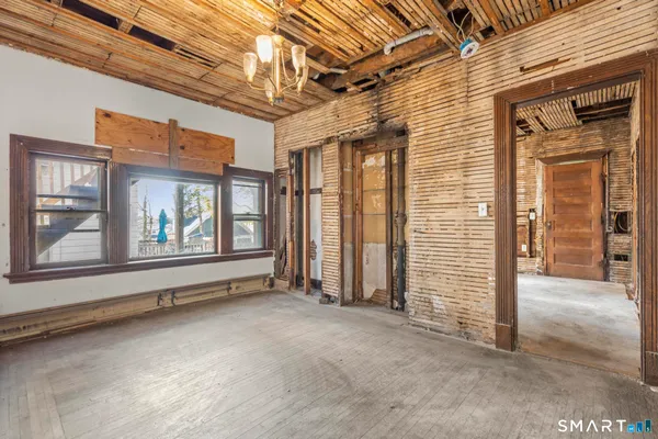 a view of an empty room with a window